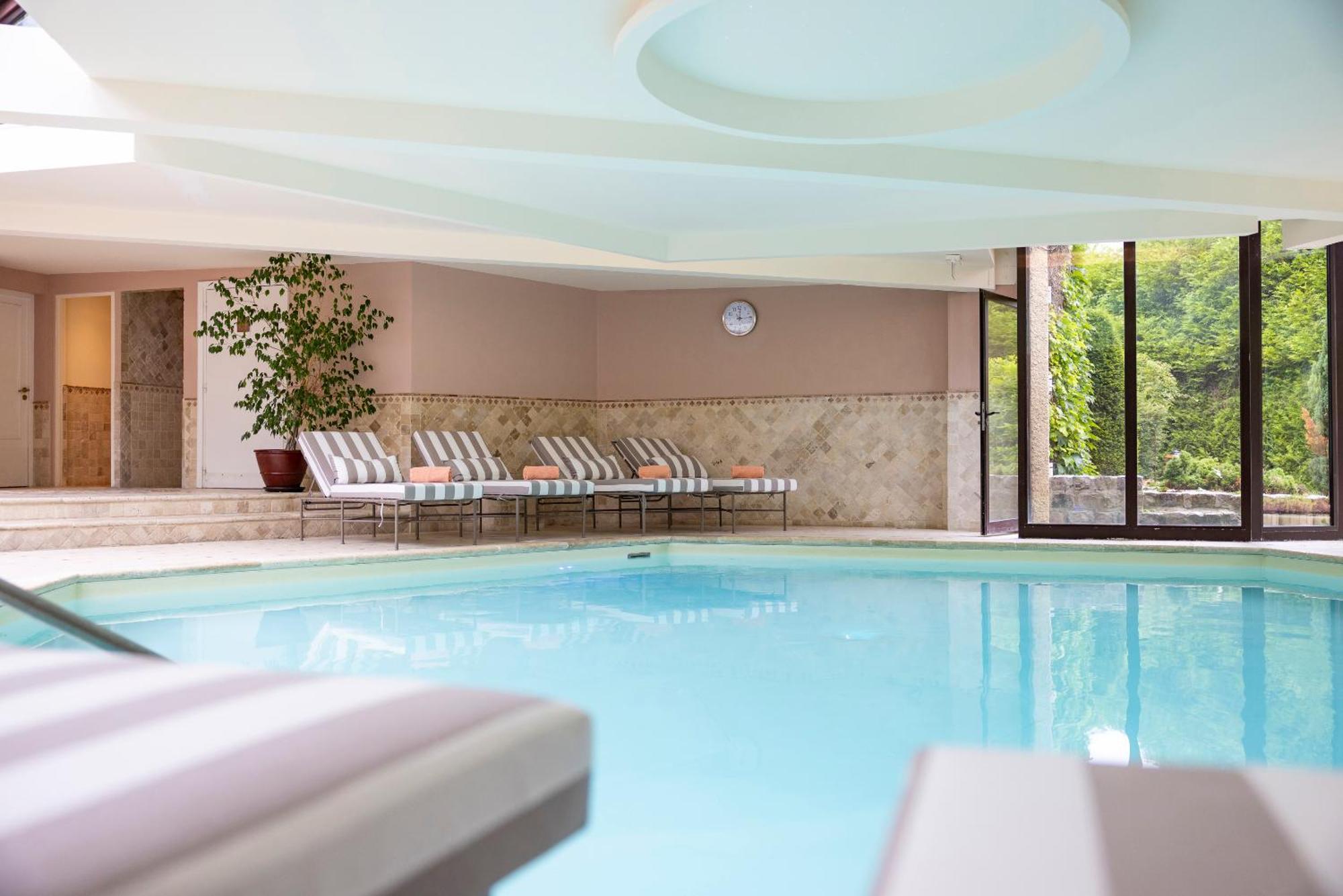 Hostellerie Briqueterie & Spa Champagne Vinay  Exterior foto The swimming pool at the hotel